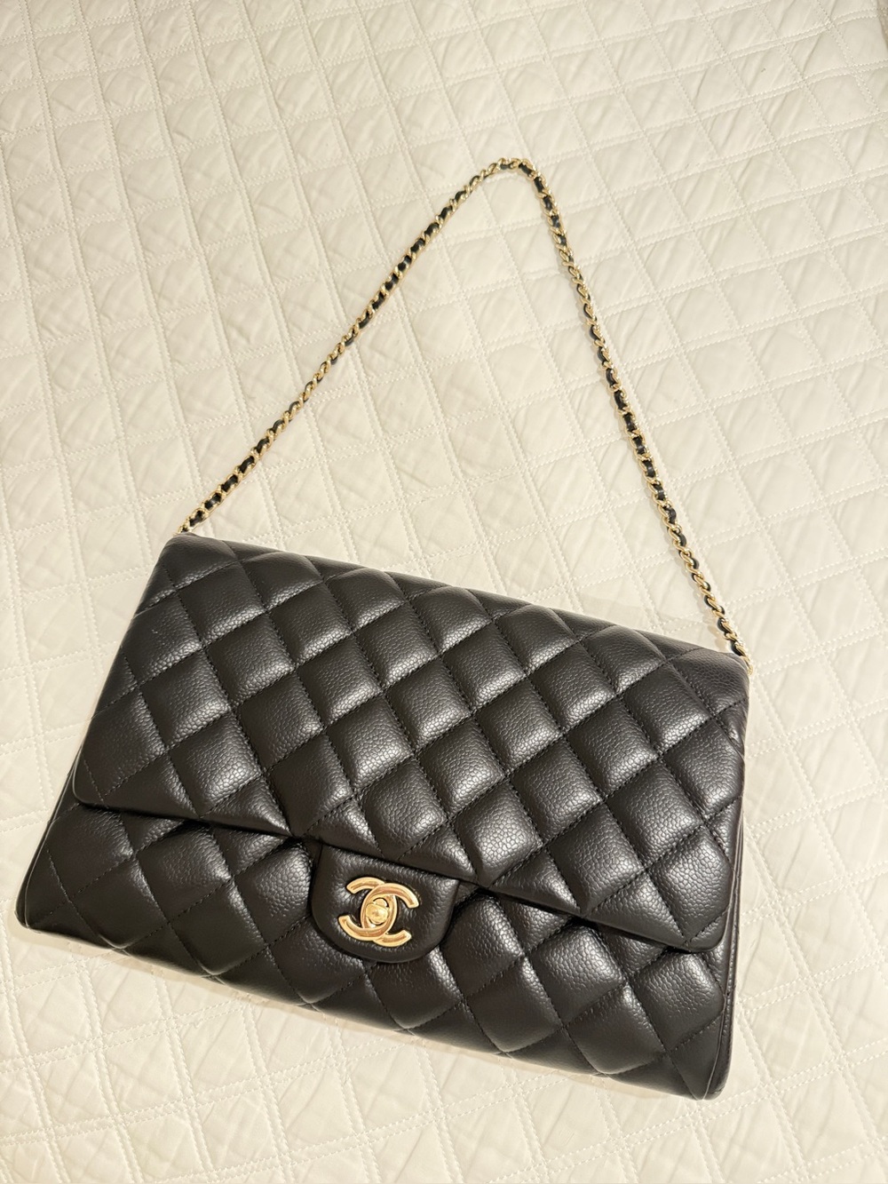 Chanel Caviar Quilted Clutch with Chain in black